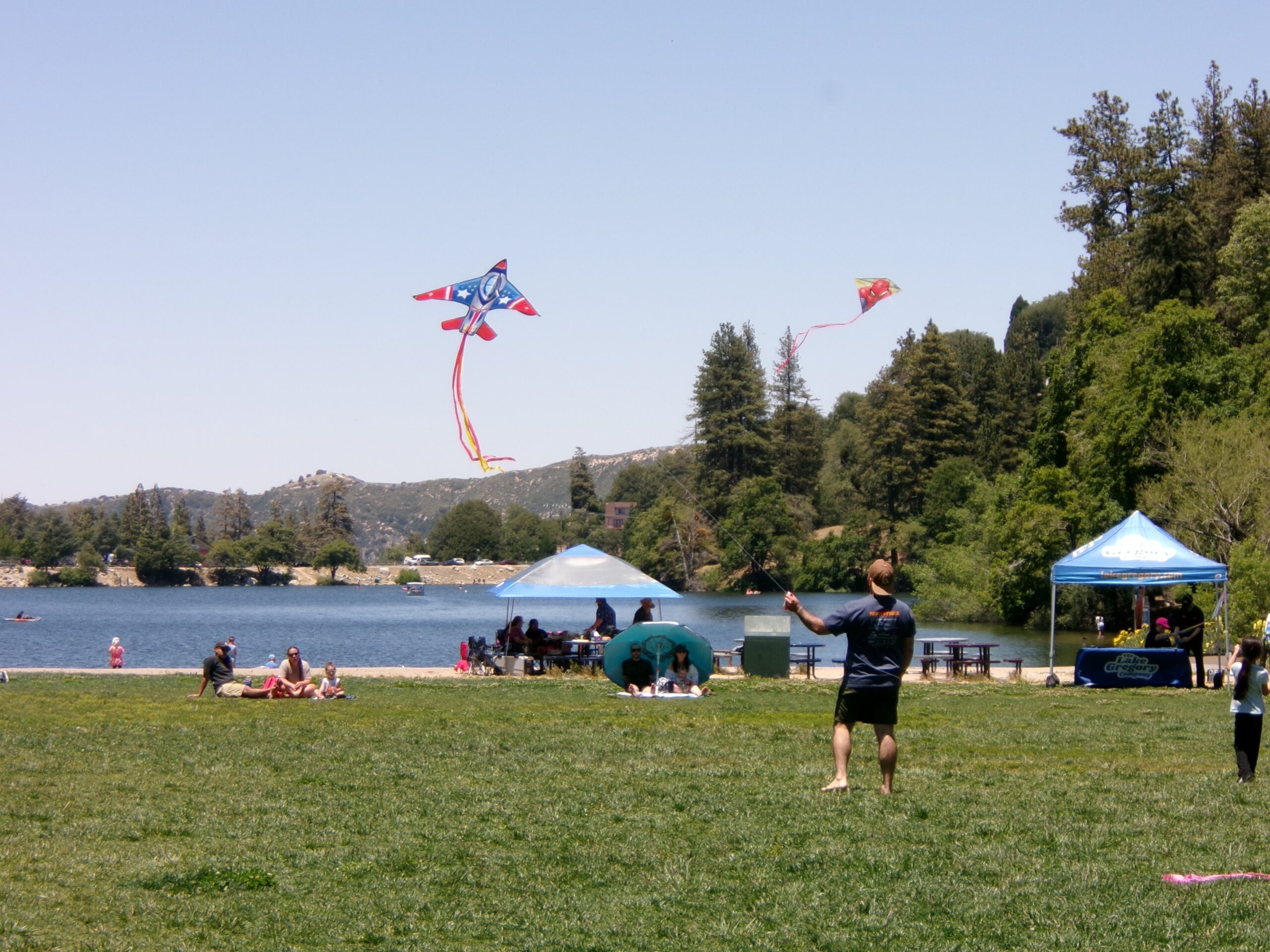 Adrianne, Lisa, Julia, Melissa and Adrianna from Glendora and Orange County enjoyed last year’s Brewfest at Tavern Bay Beach Club so much they couldn’t resist attending this year’s event. (Photos by Douglas W. Motley) A jet plane kite flying over the meadow. (Photo by Douglas W. Motley)