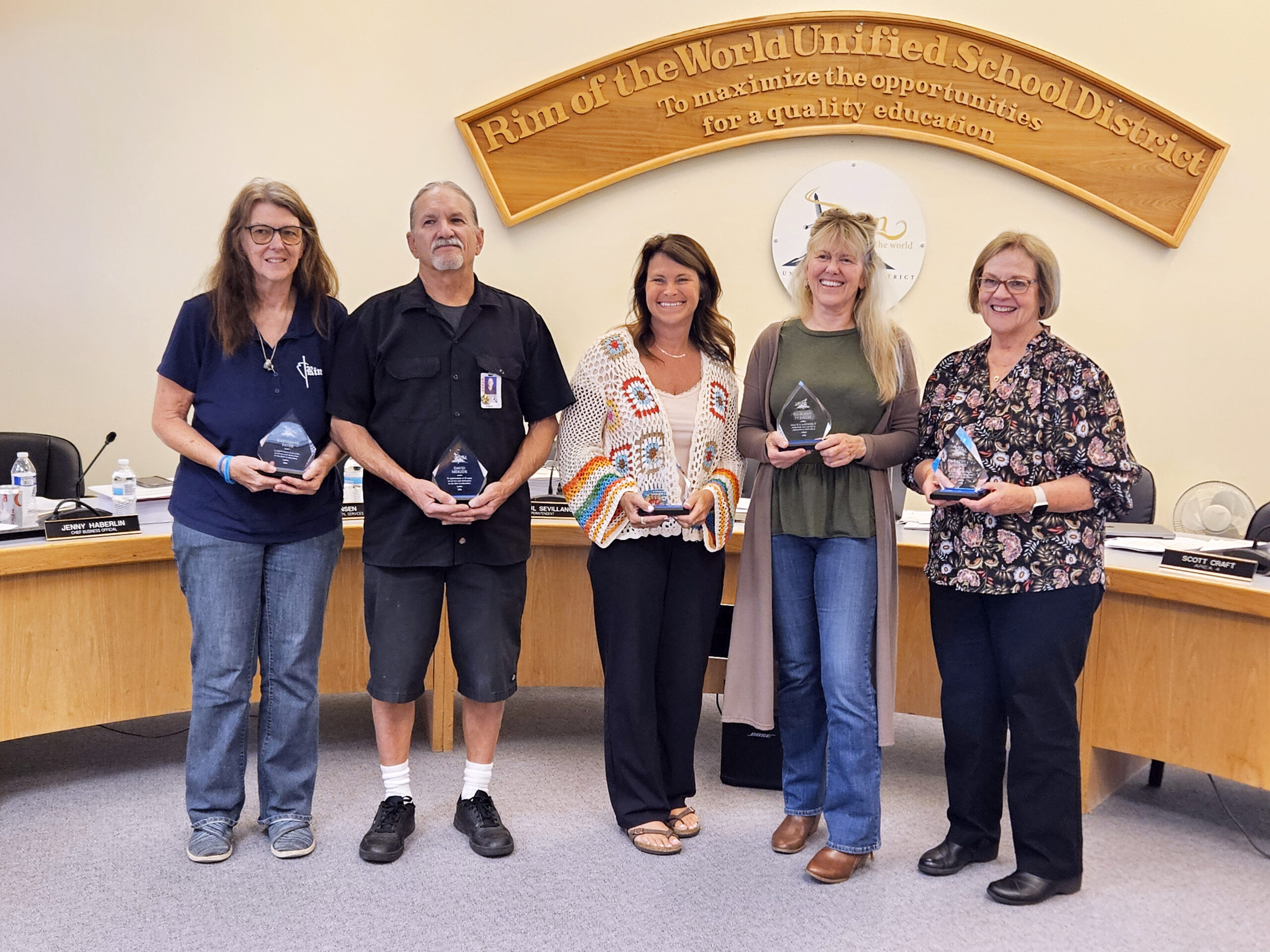 Five of the retirees – Kathy Sayer, Dave Meigide, Darlyn Phillips, Deborah Bennett and Kathy Dubois – with their awards. (Photo by Mary-Justine Lanyon)